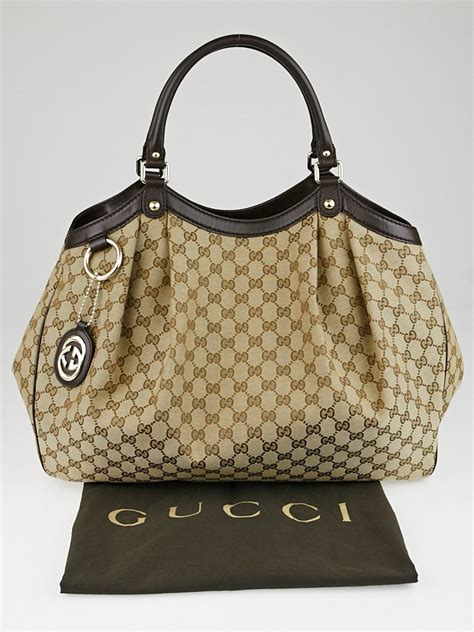 Today, vintage gucci tote bags are among the most popular on the market. Gucci Beige/Brown GG Canvas Large Sukey Tote Bag - Yoogi's ...