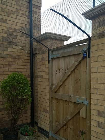 The fence i have around my enclosure is 5 ft 4 in at the top of the vertical posts. Cat Fence and Cat Fences from ProtectaPet