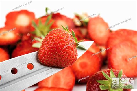 Strawberry On Knife Edge Cut Strawberries Stock Photo Picture And
