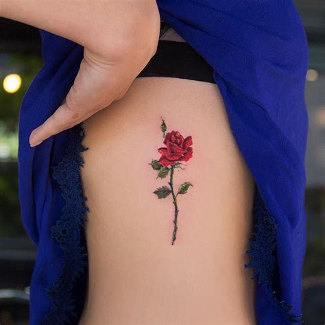Colored Rose Tattoo On Ribs By Robcarvalhoart Rib Tattoo Coloured Rose Tattoo Rose Tattoo