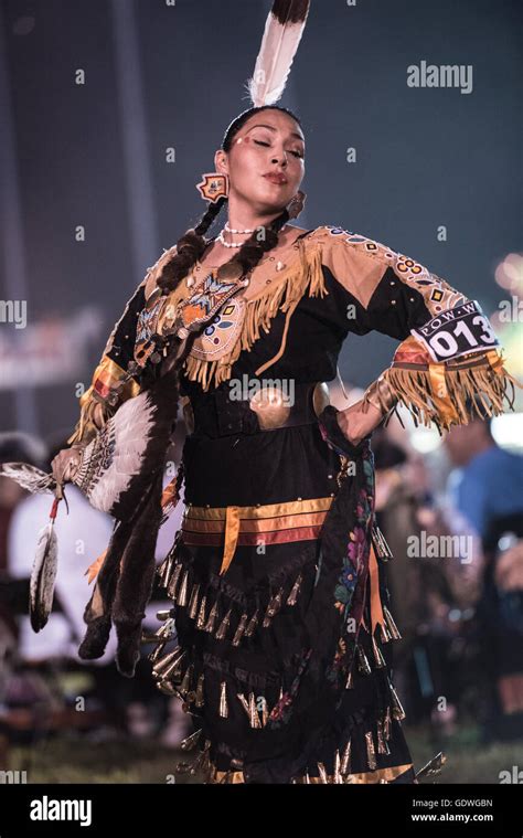 Native American Woman Performing Jingle Dress Dance During Sac And Fox Nation Pow Wow Stroud