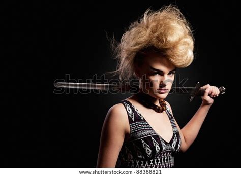 Young Warrior Woman Holding Sword Her Stock Photo 88388821 Shutterstock