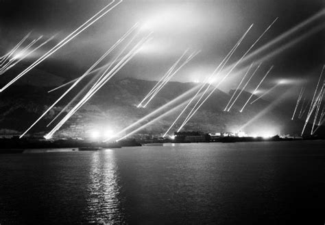 Searchlights Pierce The Night Sky During An Air Raid Practice On