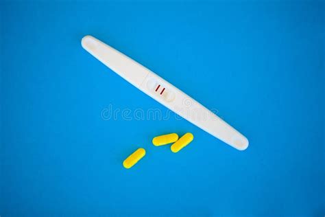 The Result Is Positive Close Up Of Pregnancy Test And Contraceptive Pills Birth Control Concept