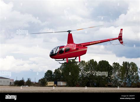 Robinson R44 Turbine In Flight At Breighton Airfield Stock Photo Alamy