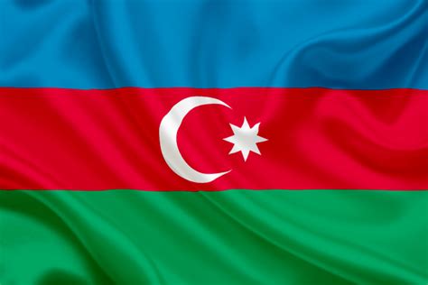 The azerbaijani flag is a vertical tricolour with in the center an emblem. National flag of Azerbaijan