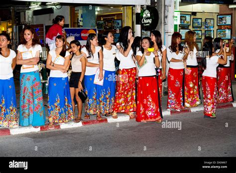 Massage Girls Watching A Parade In Patong Phuket Thailand Stock Photo Alamy