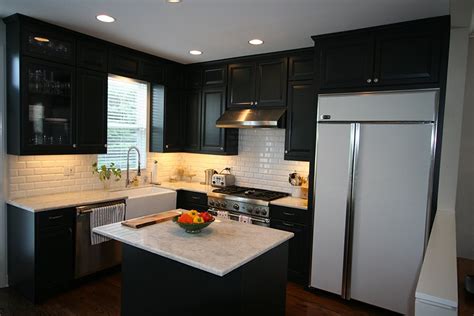 White and gray painted cabinets, countertop and backsplash choices and update ideas for any style of decorating a white or gray kitchen with black appliances. kitchen remodel custom black cabinets | Stratagem