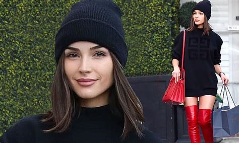 Olivia Culpo Sizzles In Red Hot Thigh High Boots And Short Sweater