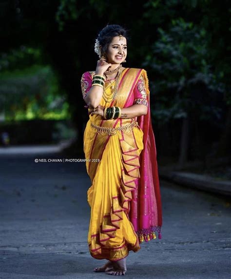 Photo Of A Marathi Bride In A Yellow Saree With Red Border Artofit