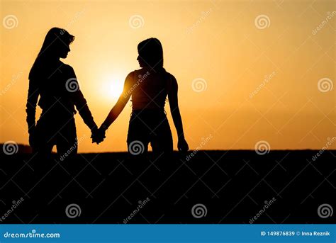 Two Girls Holding Each Other Hands Ladies Couple On The Beach Stock Image Image Of Beautiful