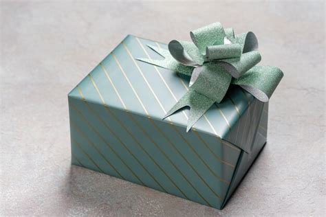 Premium Photo One Gift Box In Turquoise Packaging