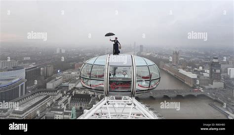A Mary Poppins Stunt Double Rides On Top Of The Coca Cola London Eye Ahead Of The European