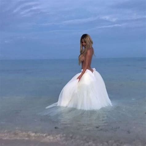 Kim Zolciak Biermann Poses Topless After Vow Renewal To Husband Kroy Photo