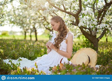 The Beautiful Girl The Blonde In The Blossoming Apple Trees Garden Stock Image Image Of