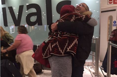 The Story Behind The Viral Photo Of A Syrian Couple Hugging At An Airport