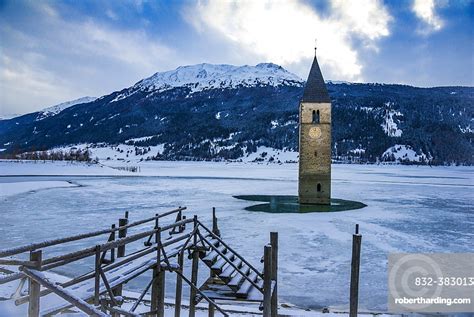 Church Tower In Lake Reschen Stock Photo