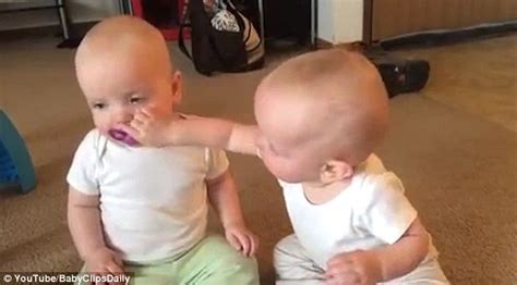 Viral Video Shows Cute Twin Babies Fighting Over A Pacifier