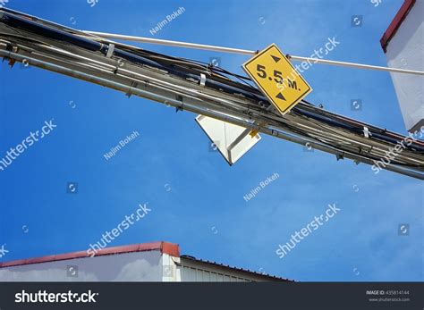 Sign Indicating Height Restriction Yellow Background Stock Photo