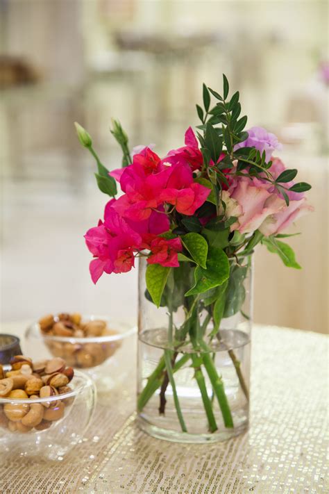 The finer things coffee table book. simple stems | Coffee table flowers arrangements, Table ...