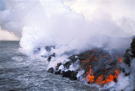 Aa Lava Flow Entering The Sea Dusk Cape Hammond Galapagos Stock