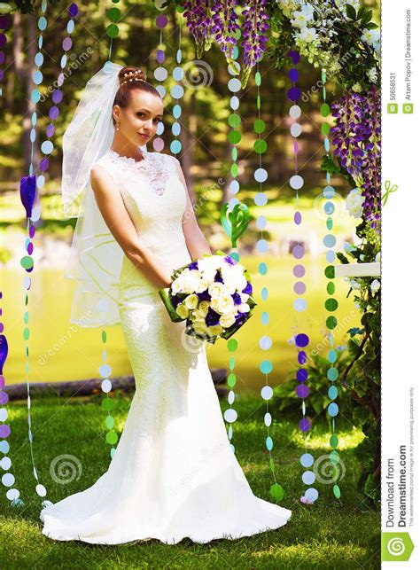 Cute Bride In Beautiful Flower Arch Stock Image Image Of