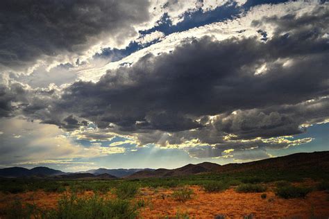 Sun Rays Over The Dragoon Mountains Arizona Photograph By Chance Kafka