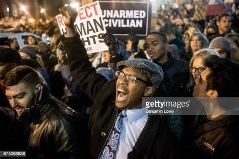 Protest Against Eric Garner Grand Jury Decision Photos And Premium High