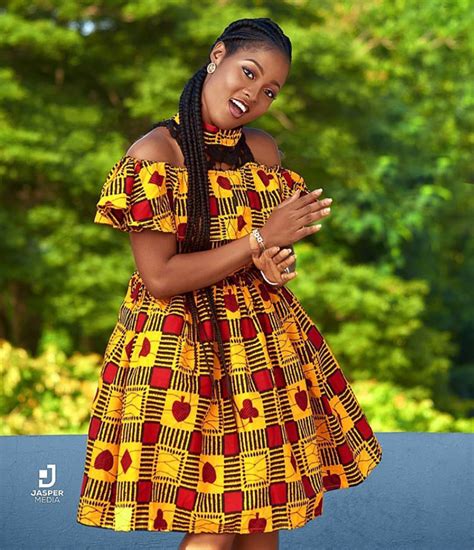 clipkulture lady in beautiful off shoulder african print dress with cape and choker ankara
