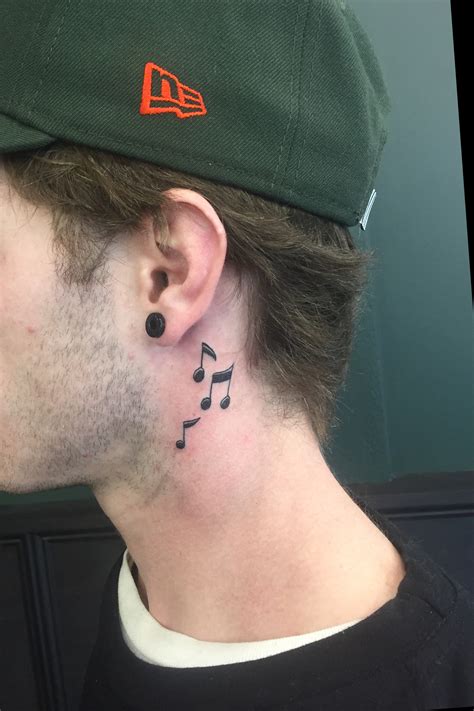 Music Notes Tattoos Behind The Ear