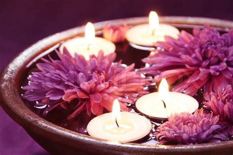 The first and most obvious reason is the convenience, as i'm sure you have we'll be going over those reasons, as well as the best places for buying candles online in this post. Aroma Bowl with Candles and Flowers in Violet | Stock ...
