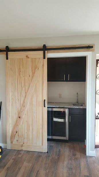 Barn Door To Wet Bar Basement Design Tall Cabinet Storage Wet Bar