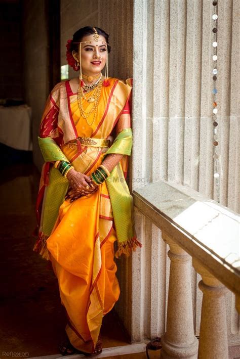 Photo Of A Marathi Bride In A Yellow Saree With Red Border Indian Bride Poses Indian Wedding