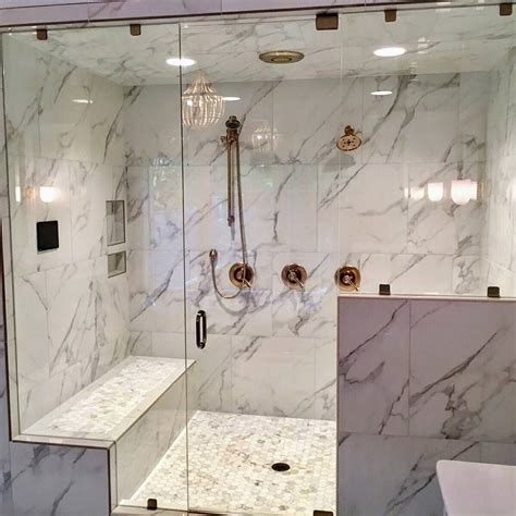 marble look porcelain tile calacatta gold hexagon marble floor gold fixtures best bathroom