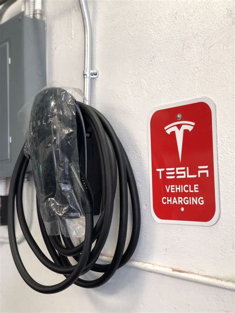 Charging a tesla is just like charging your phone. TESLA VEHICLE CHARGING STATIONS, 240V 30MPH CHARGE for ...
