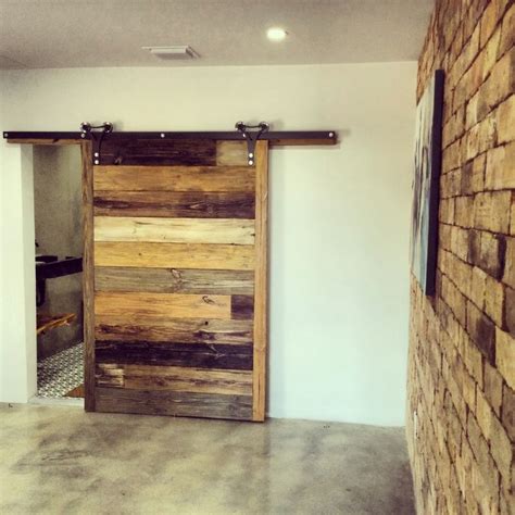 Amazing Large Single Sliding Barn Door With Brick Wall