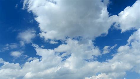 Summer Clouds Fly Across A Royal Blue Sky Hd 1080p Timelapse Stock