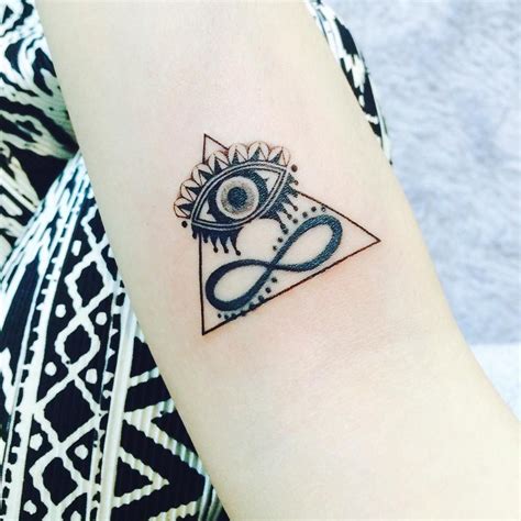 Tiny Evil Eye Tattoo Ideas To Ward Off Misfortune Evil Eye Tattoo