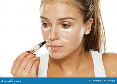 Woman Applying Concealer Stock Image Image Of Dark 107918885
