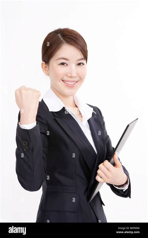 Young Businesswoman With Clenched Fist Stock Photo Alamy