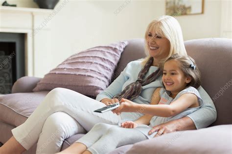 Grandmother And Granddaughter On Sofa Stock Image F0154410 Science Photo Library