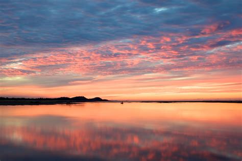 Orange Sunset Over Water Orange Sunset Over Water The Sun Flickr