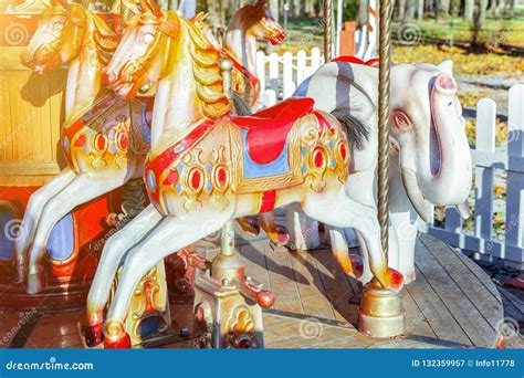 Vintage Merry Go Round Flying Horse Carousel In Amusement Holliday Park