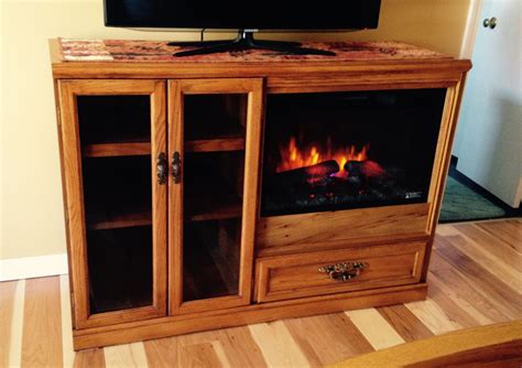 This rustic electric fireplace tv stand is made of wood, abs, resin, tempered glass, and metal. Pin by Riva Sakina on DIY TV Stand | Diy fireplace ...