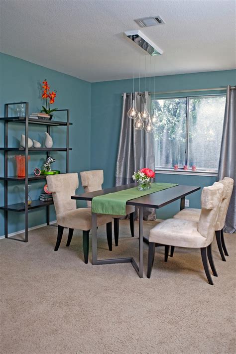 Blue Mid Century Modern Dining Room With Neutral Velvet
