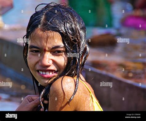 Girl Bathing In Holy River Of India Stock Photo Alamy