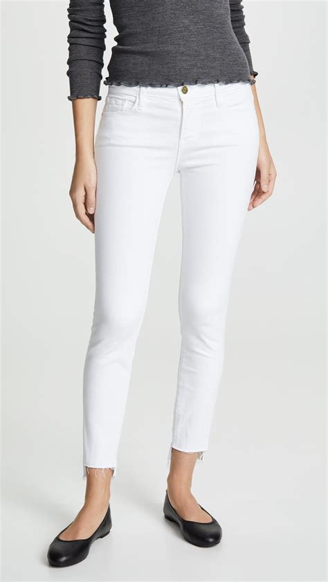Frame Denim Le Skinny De Jeanne Stagger Hem Jeans In White Lyst