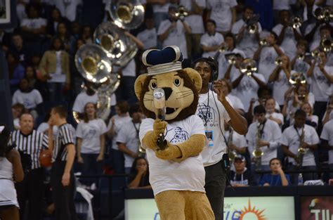 Odu Mascot Big Blue Takes Aim Before Firing Another T Shirt Into The
