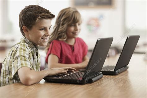 Two children using laptop computers - Stock Image - F013/1881 - Science ...