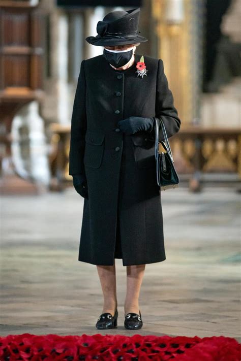 O lord have mercy on her. Queen Elizabeth wears face mask in public for ceremony to ...